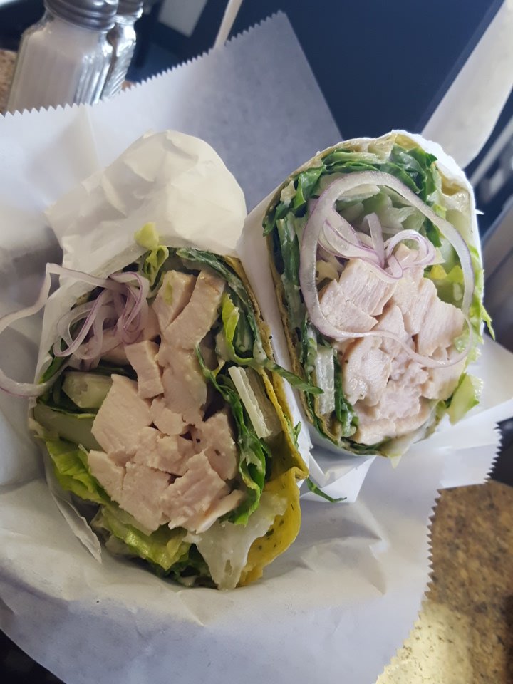 Order W1- Grilled Chicken Caesar Wrap food online from Munch A Sub store, Las Vegas on bringmethat.com