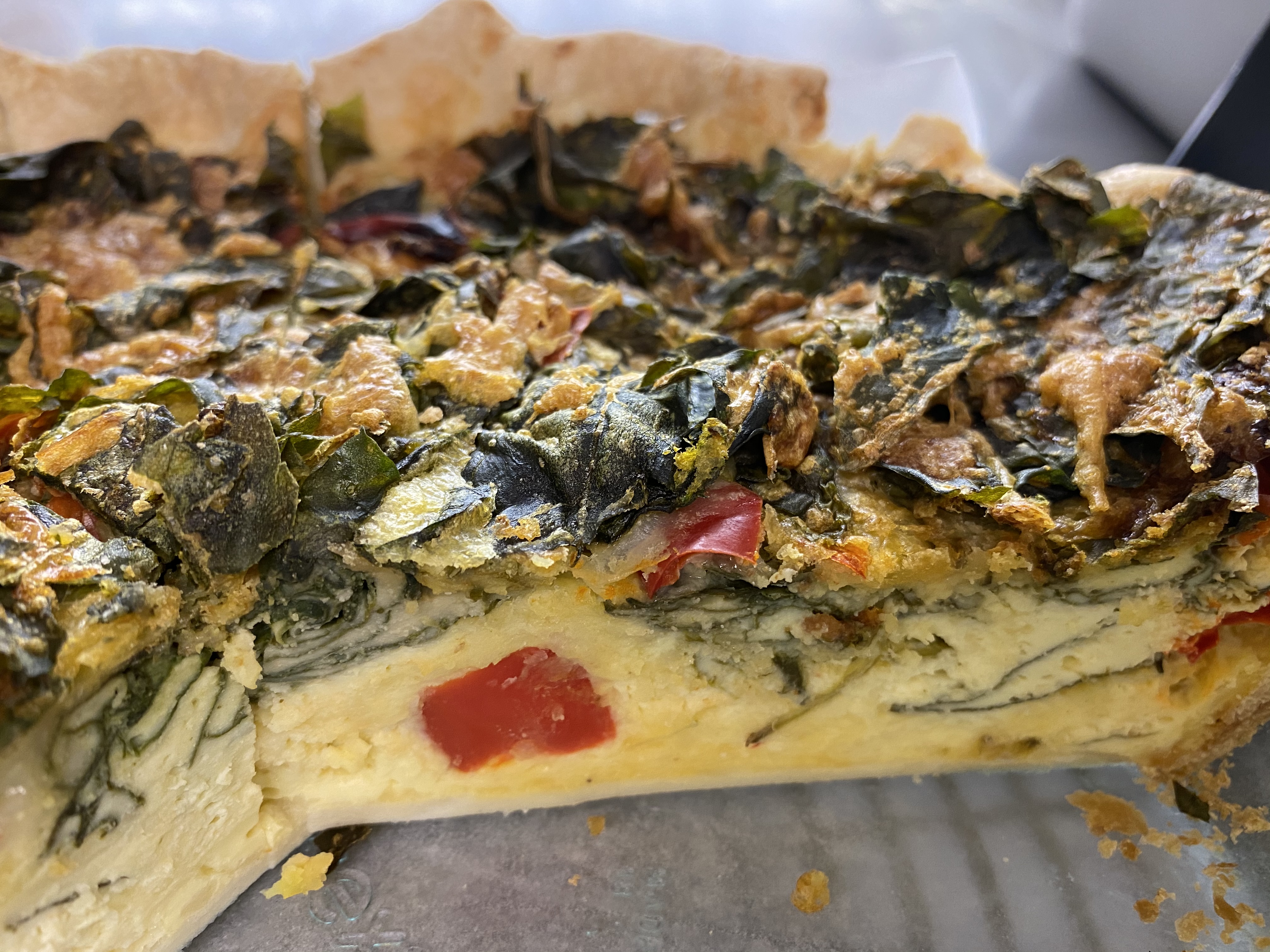 Order Spinach Red Pepper Quiche food online from Barry Espresso Bakery & Deli store, Eugene on bringmethat.com