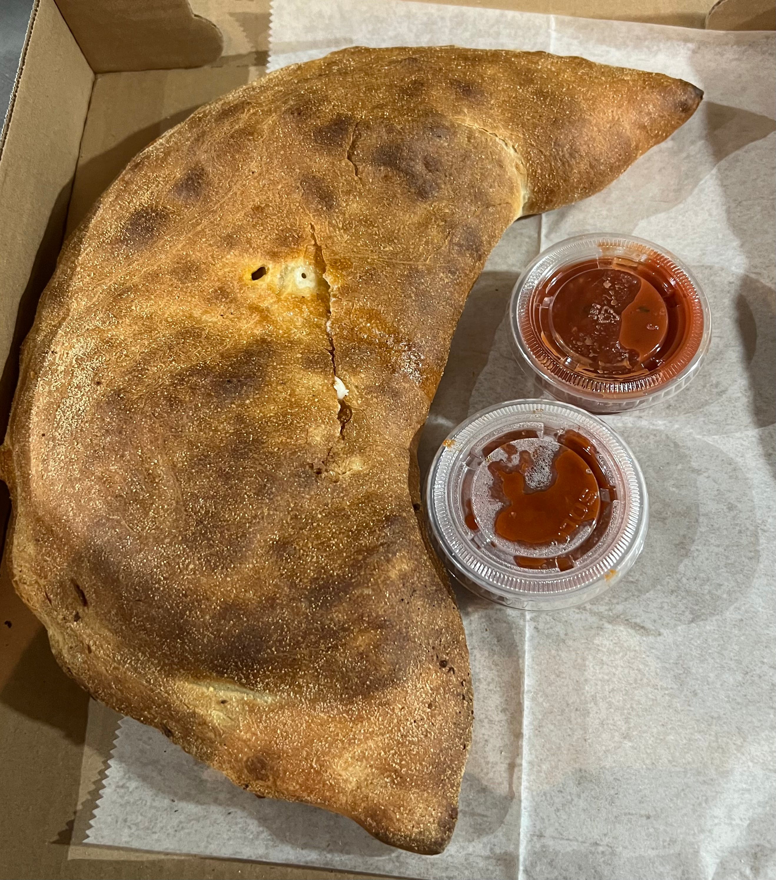 Order Sausage & Roasted Peppers Calzone - Signature Calzones food online from Rustica store, Philadelphia on bringmethat.com