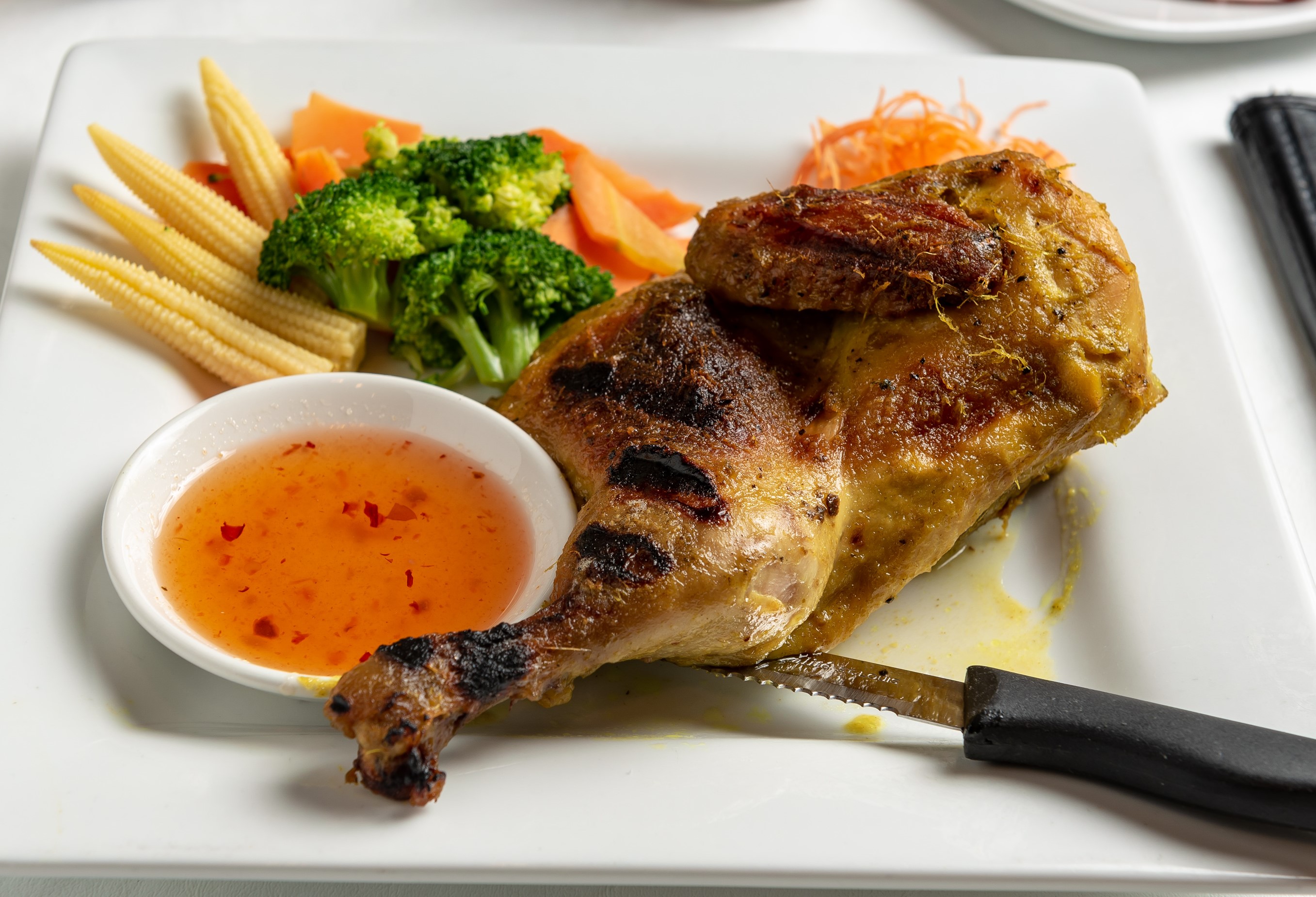 Order Thai BBQ Chicken food online from Phuket Thai Restaurant store, Huntsville on bringmethat.com