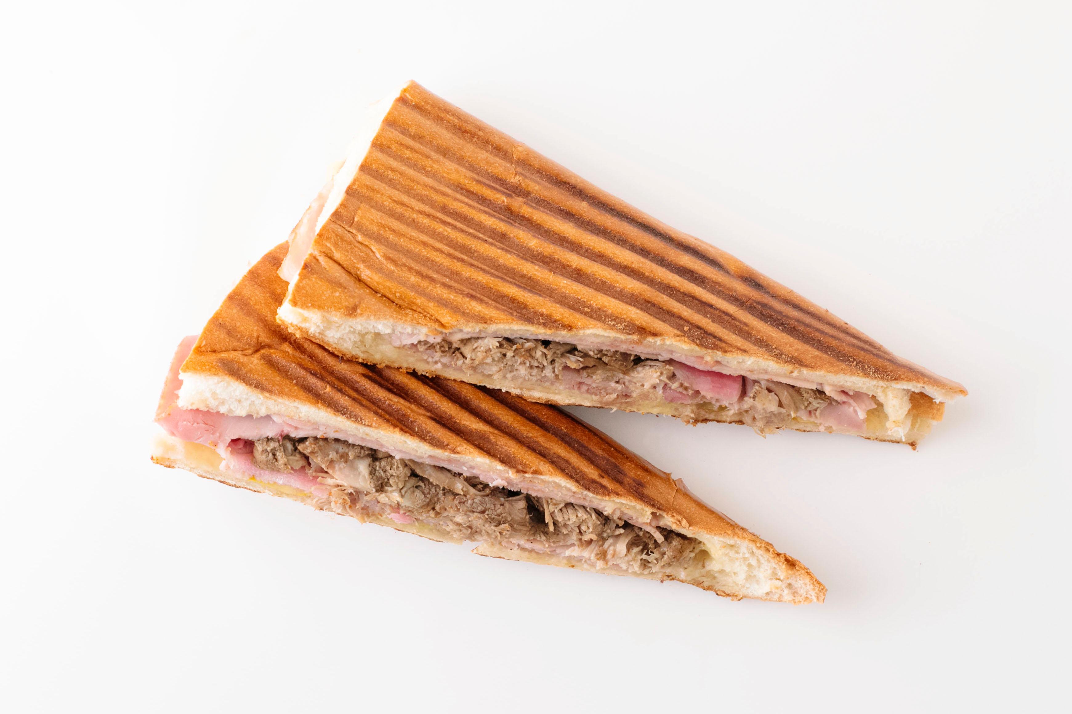 Order the "Best" Cubano S'wich food online from Cuban Kitchen store, San Mateo on bringmethat.com