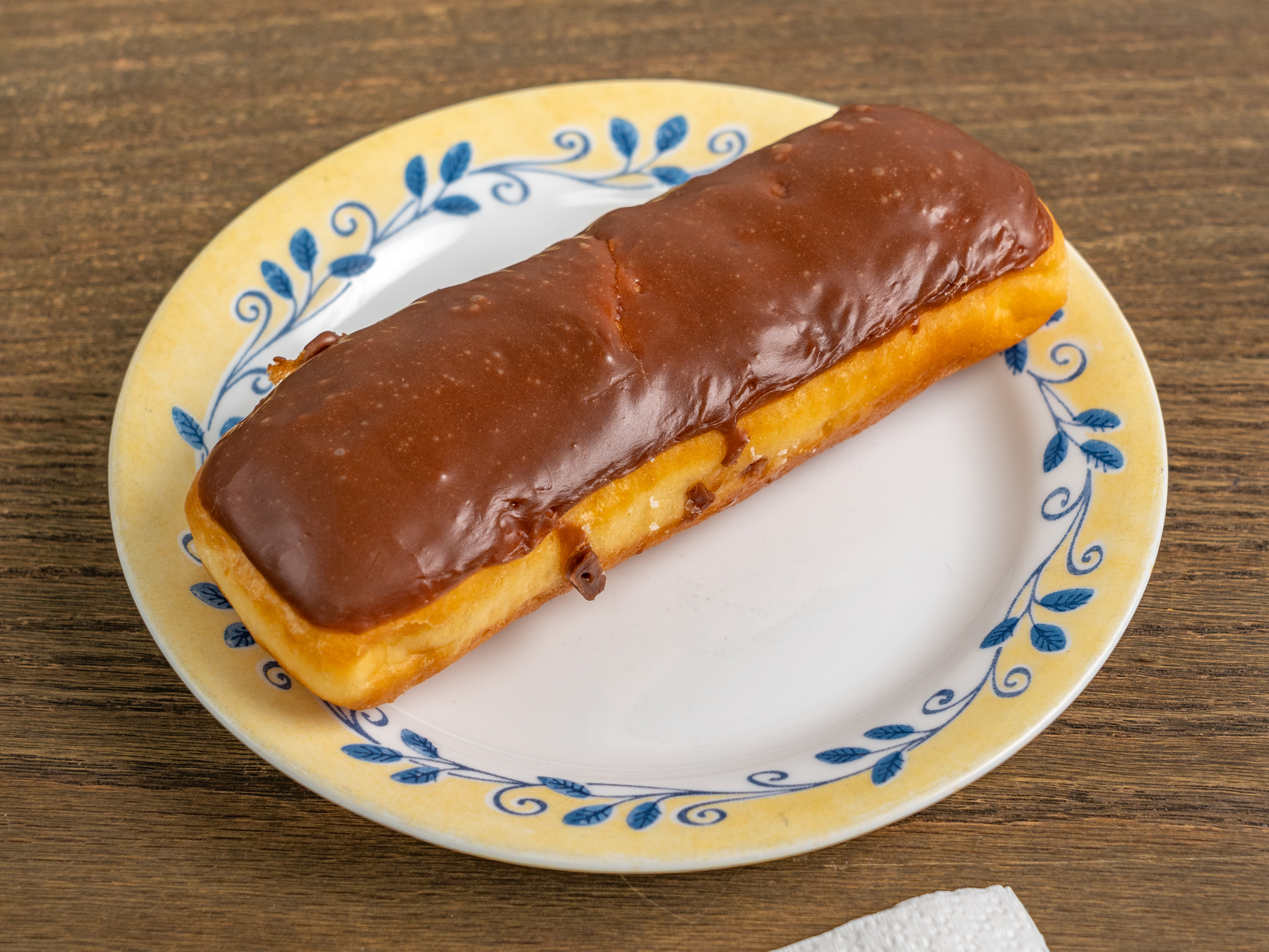 Order  Eclairs Donut food online from Snowflake Donuts store, Boerne on bringmethat.com
