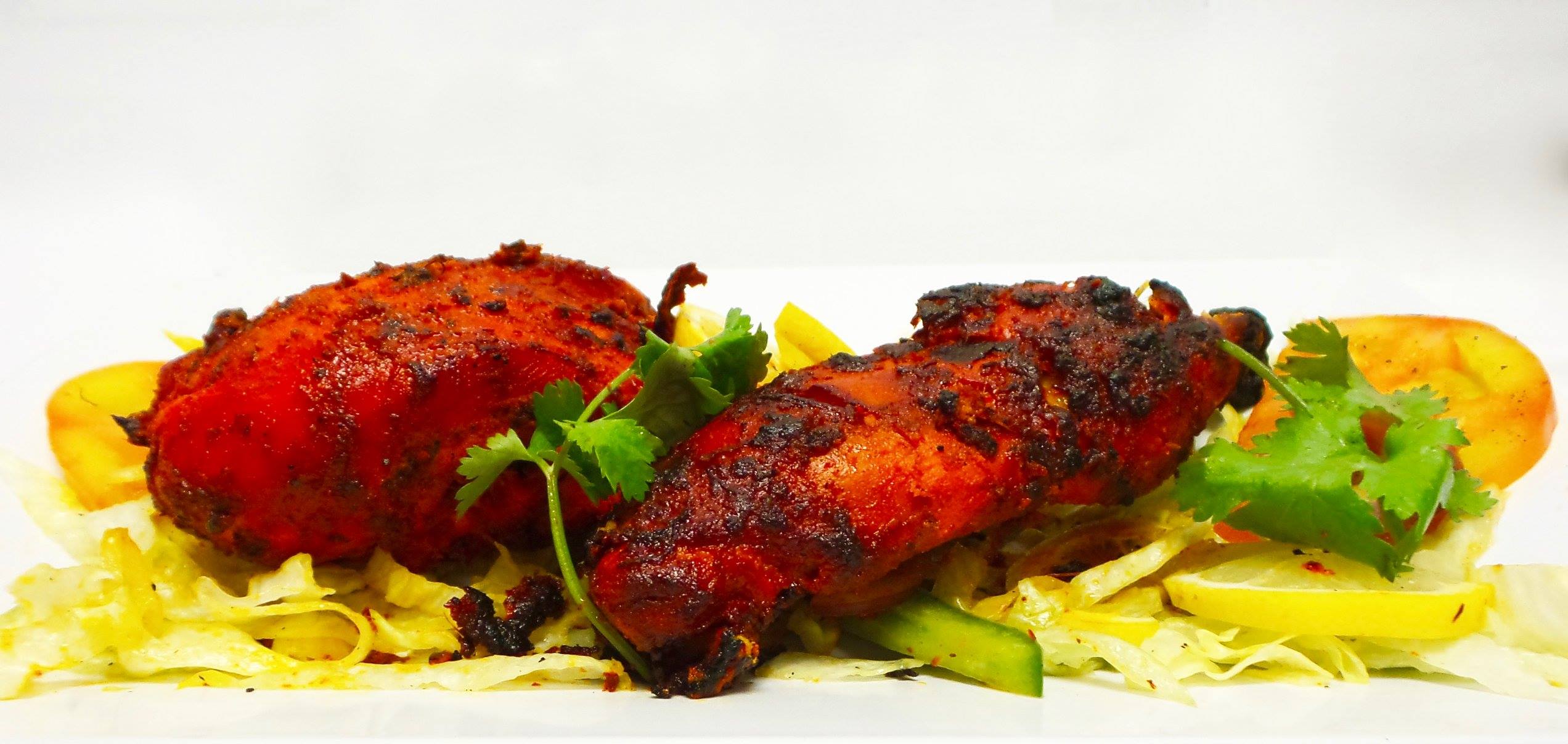 Order Tandoori Chicken food online from India Cafe store, White Plains on bringmethat.com