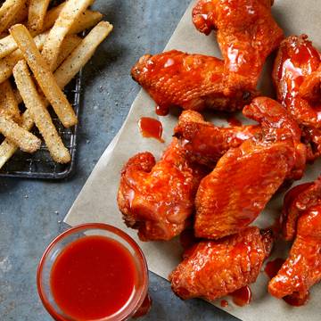 Order 12 Bone-In Wings food online from Conviction Chicken and Wings store, West Covina on bringmethat.com