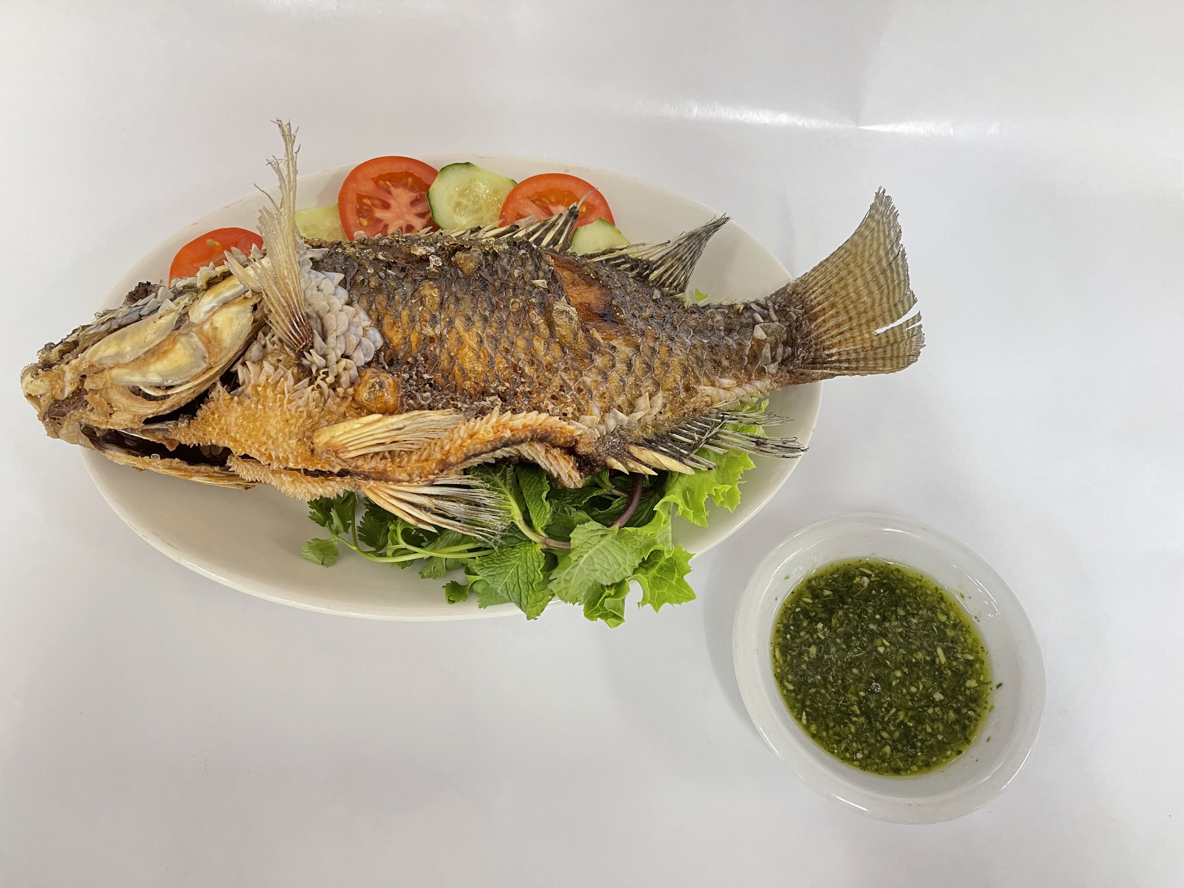 Order Ca Ro Phi Chien - Fried Tilapia Fish  food online from Joyful House store, Saint Louis on bringmethat.com