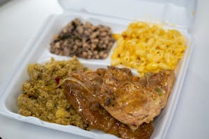 Order Smothered Chicken Plate food online from Houston This Is It Cafe store, Houston on bringmethat.com