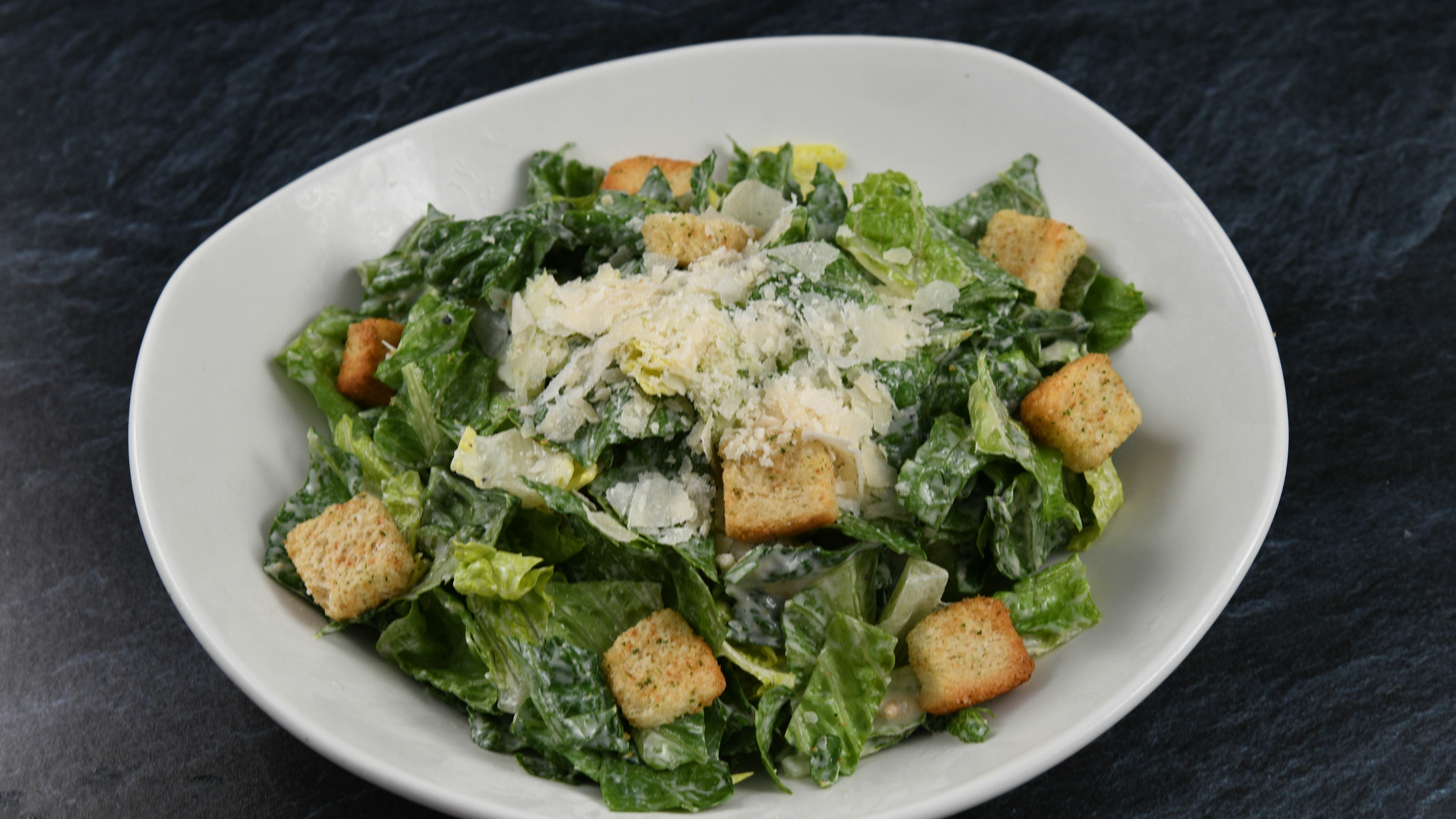 Order Little Islander Caesar Salad food online from Rainforest Cafe store, Tempe on bringmethat.com