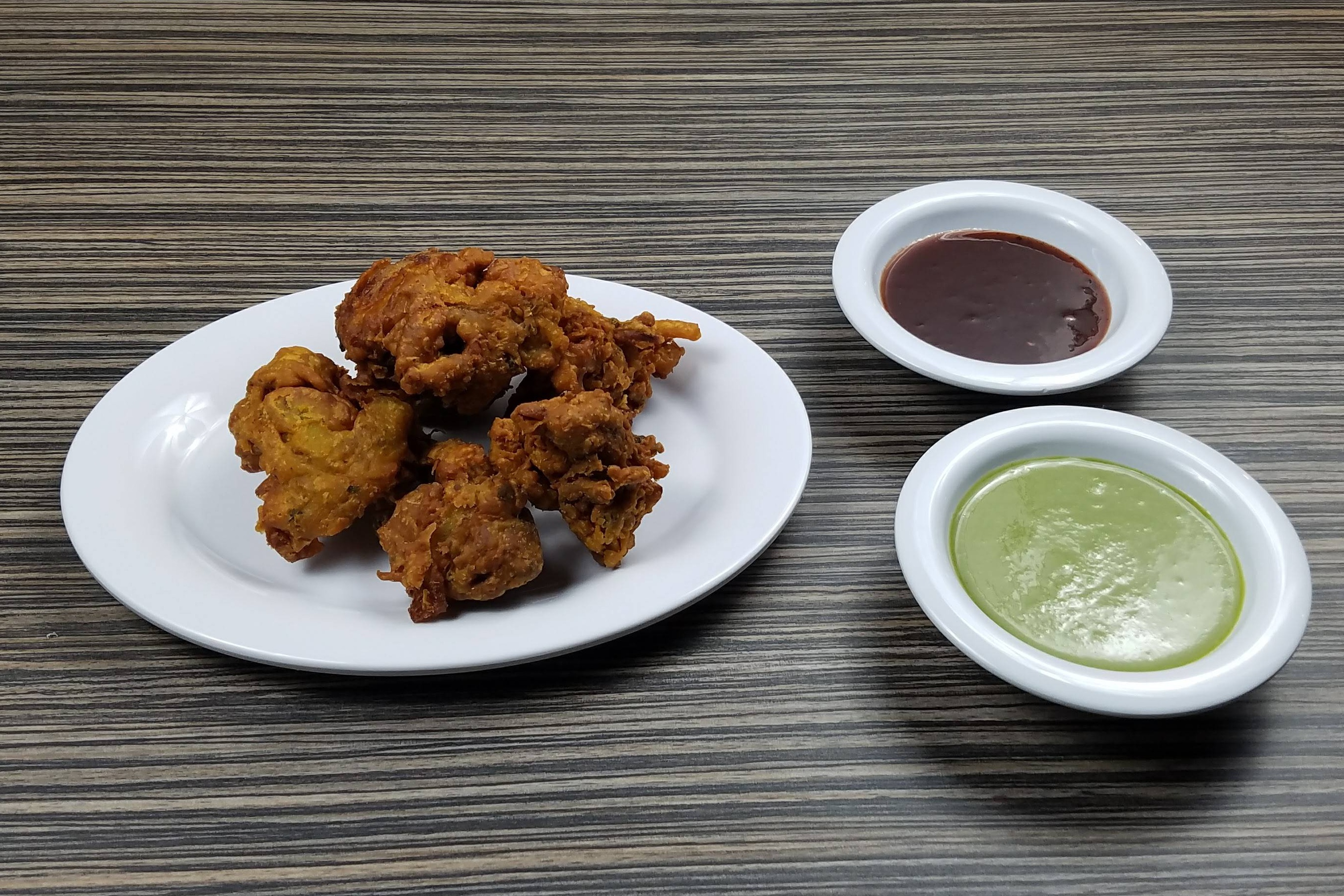Order Mix Veg Pakora food online from MasalaCraft Indian Cuisine store, Santa Ana on bringmethat.com