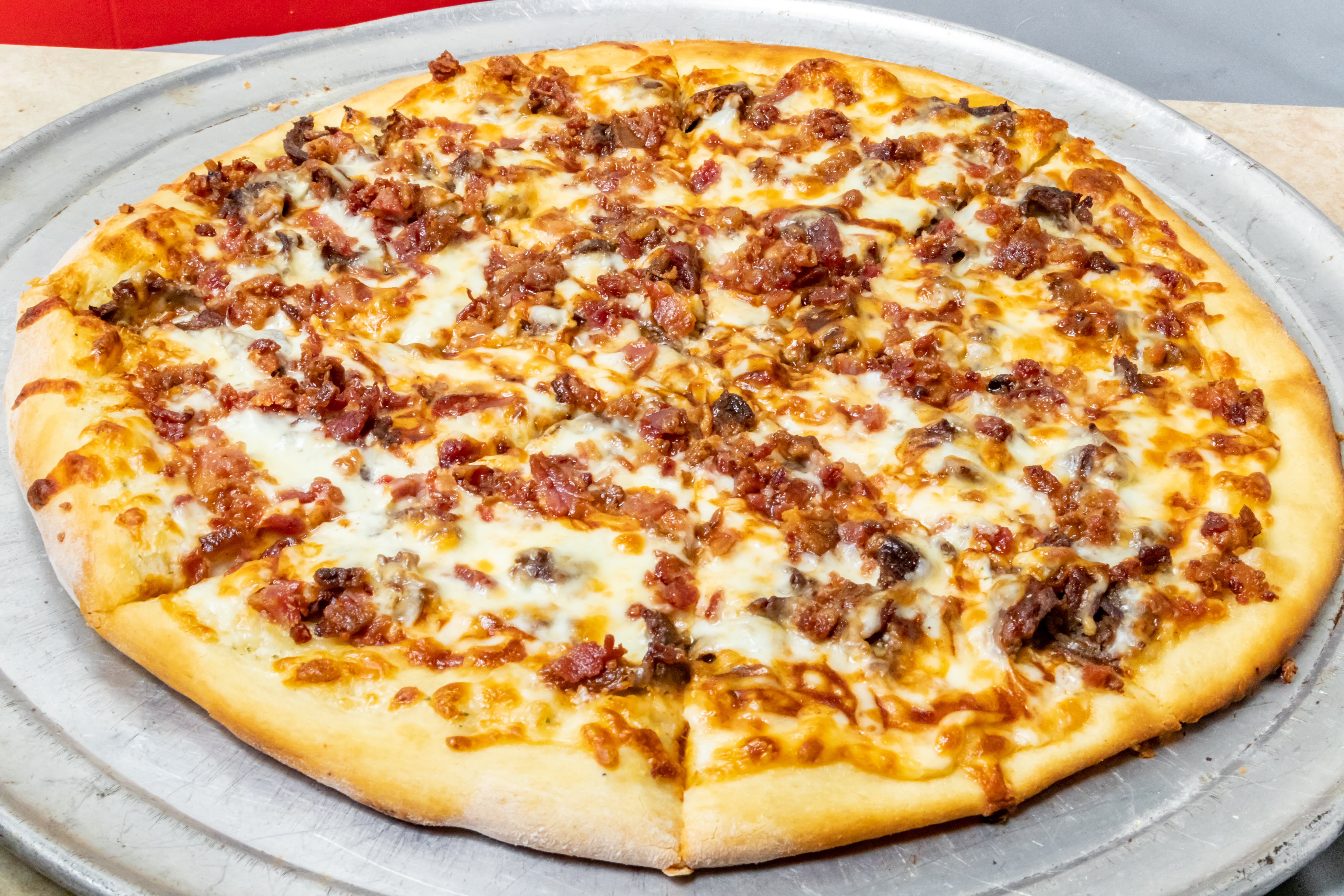 Order BBQ Steak & Bacon Pizza - Small 10" (4 Cut) food online from Novotny's Groceries & Pizza store, Worthington on bringmethat.com