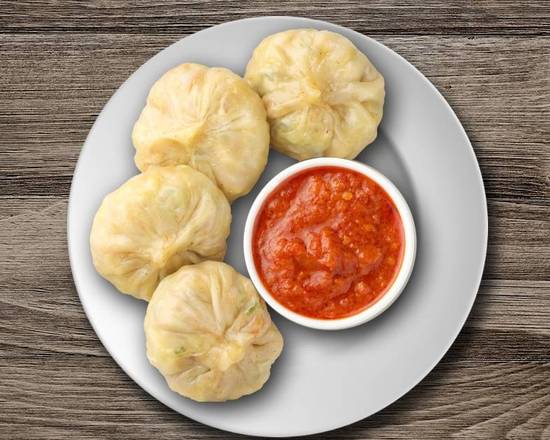 Order Veg Steamed Momo food online from Biryani Factory store, Youngstown on bringmethat.com
