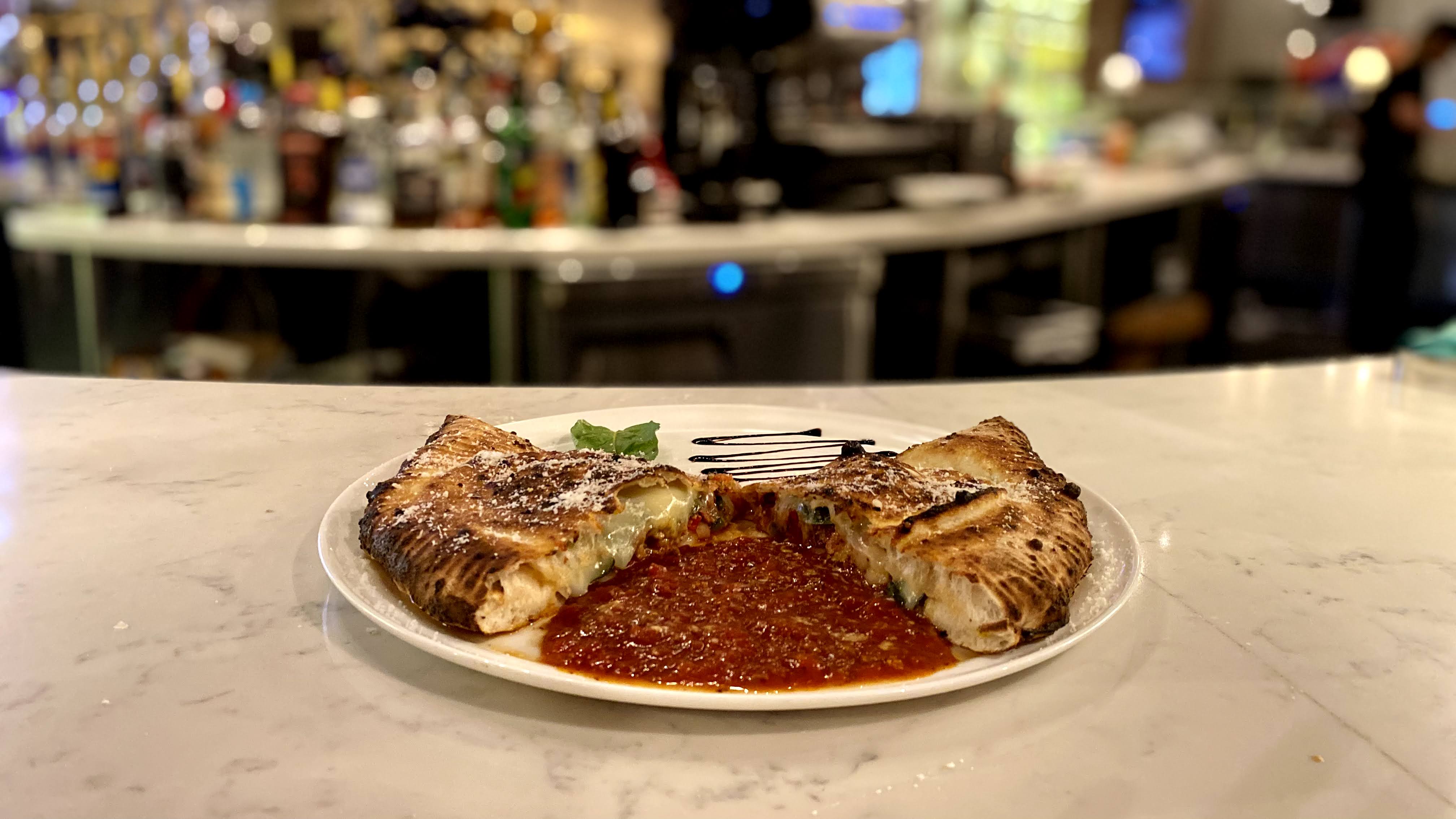 Order The Spicy Sausage Calzone food online from Midici Wood Fired Pizza store, Ventura on bringmethat.com