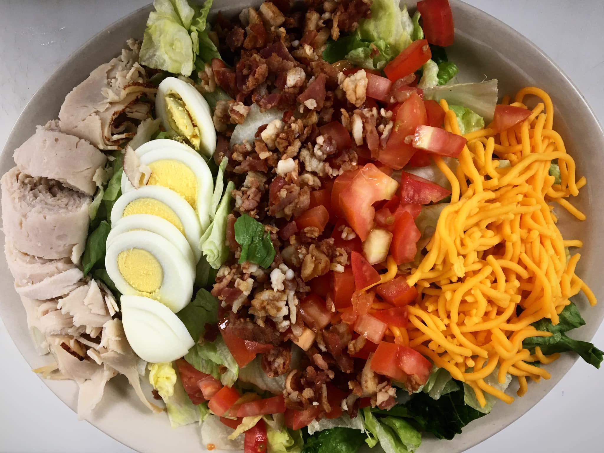Order Cobb Salad - Salad food online from Fred Italian Restaurant store, Grand Rapids on bringmethat.com