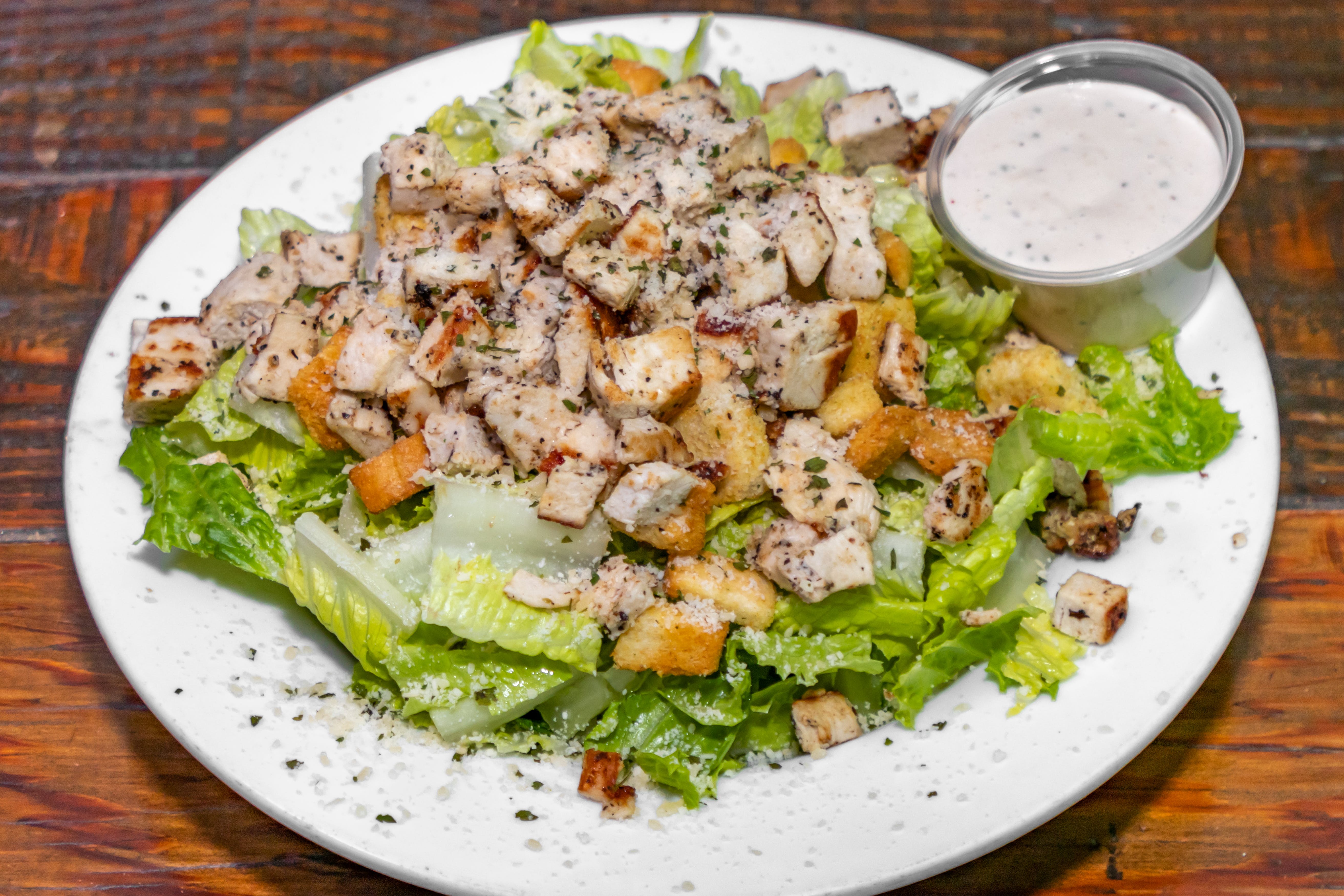 Order Chicken Caesar Salad - Medium food online from Brothers Pizza store, Las Vegas on bringmethat.com