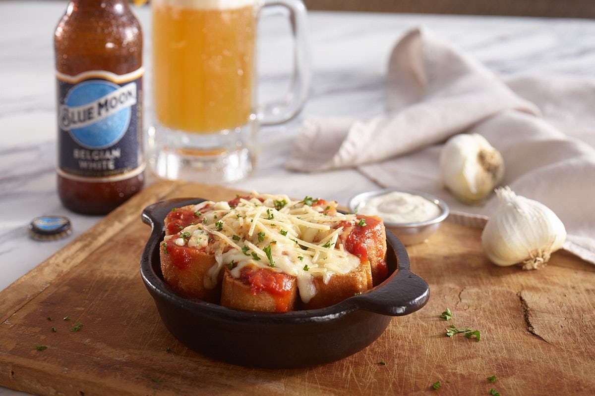 Order Cheesy Pizza Poppers food online from Ruby Tuesday store, Wilmington on bringmethat.com