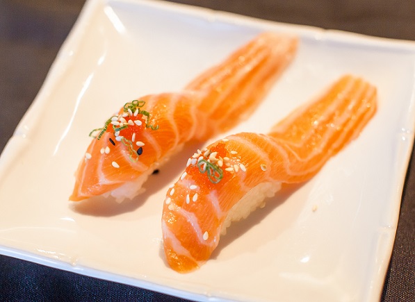 Order Salmon Belly Nigiri Sushi food online from Wild Sushi And Ramen store, Fort Worth on bringmethat.com