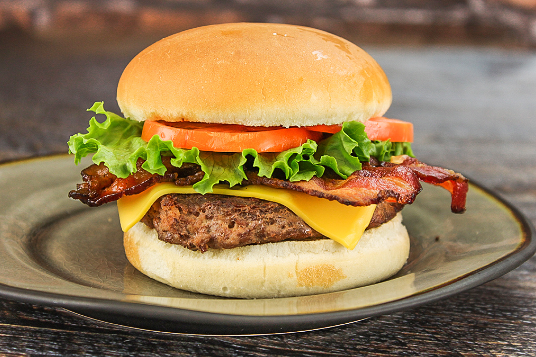 Order Bacon Cheeseburger food online from The Depot Express store, Montezuma on bringmethat.com