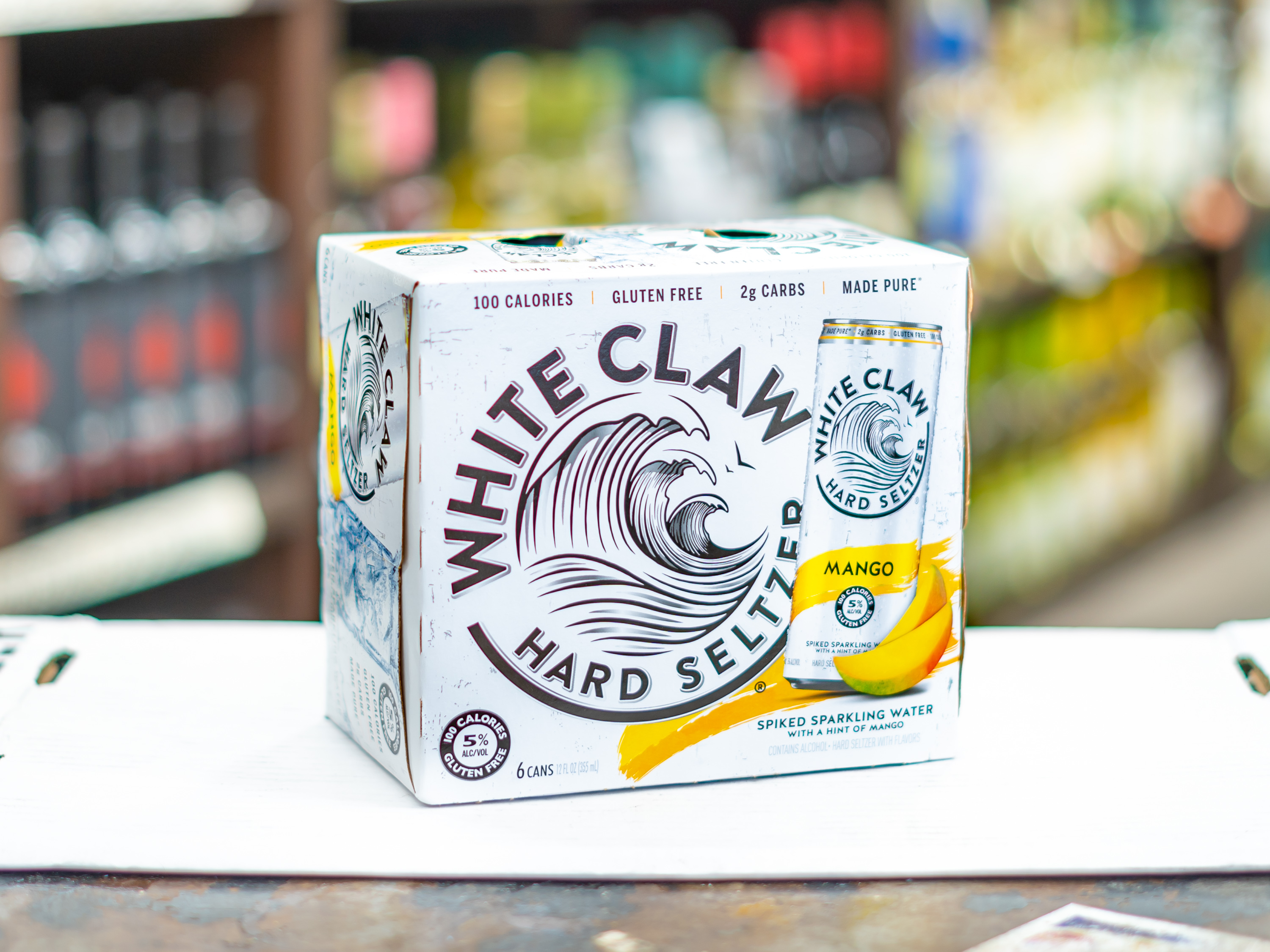Order 6 Pack White Claw Raspberry Hard Seltzer food online from 5 Star Market and Liquor store, La Mesa on bringmethat.com