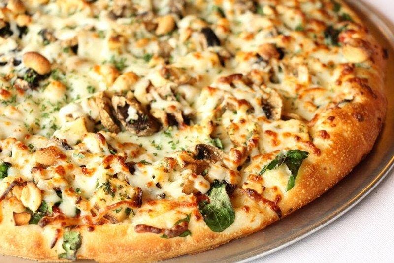 Order Nutty Chicken Pizza - Small 10'' (6 Slices) food online from Palio S Pizza Cafe Colleyville store, Colleyville on bringmethat.com