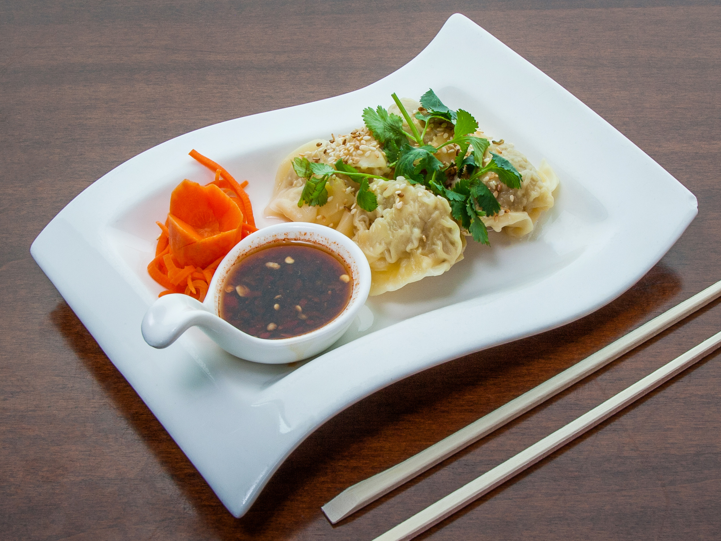 Order Sesame Chicken Dumplings (5) food online from VIP Thai Cuisine store, Woodridge on bringmethat.com