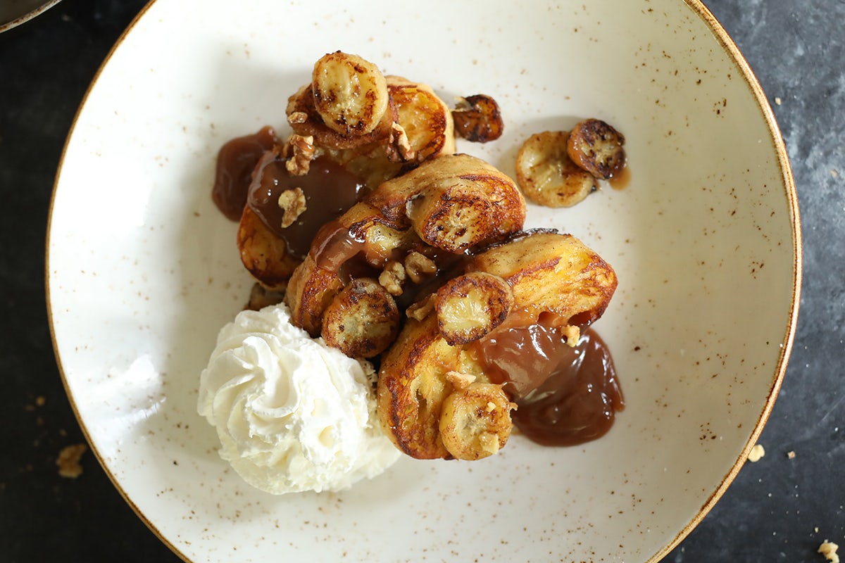 Order Bananas Foster French Toast food online from Lazy Dog store, Rancho Cucamonga on bringmethat.com