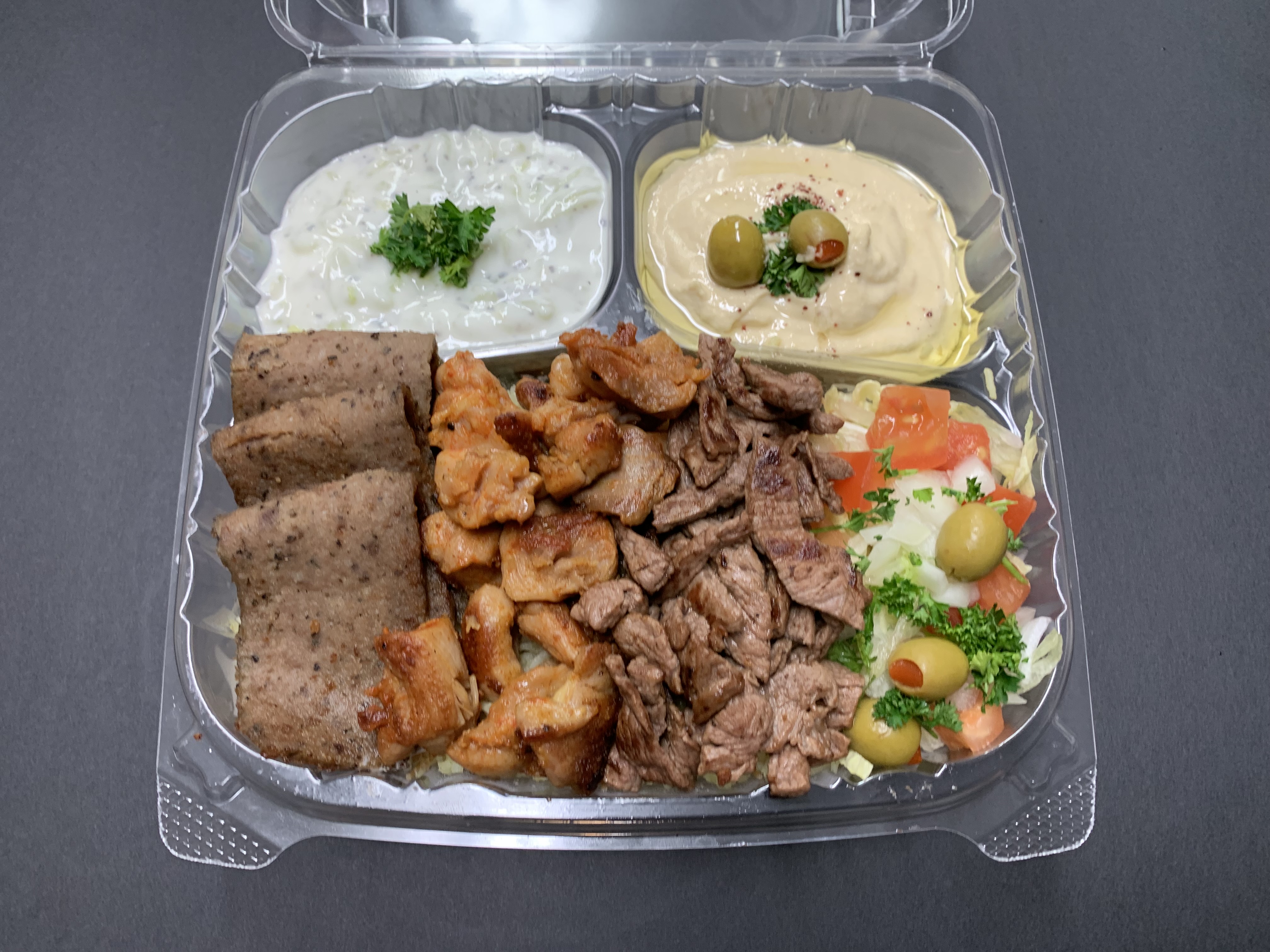 Order Triple Meat Plate With Pita Bread صـحن ثـلاث انـواع  food online from Abu Omar Gyros & Shawarma store, Portland on bringmethat.com
