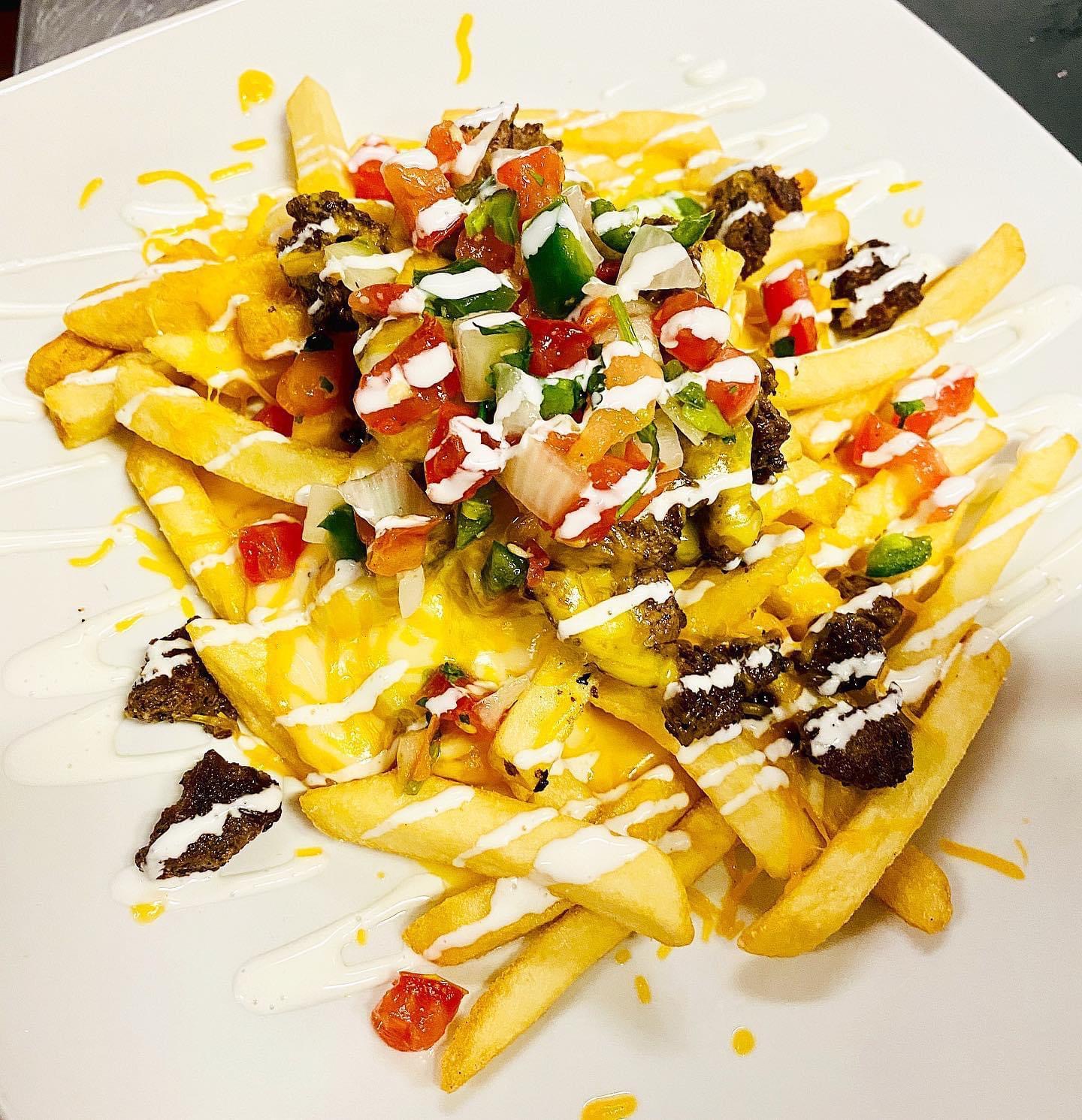 Order Asada Fries  food online from La Milpa Mexican Restaurant store, Denton on bringmethat.com