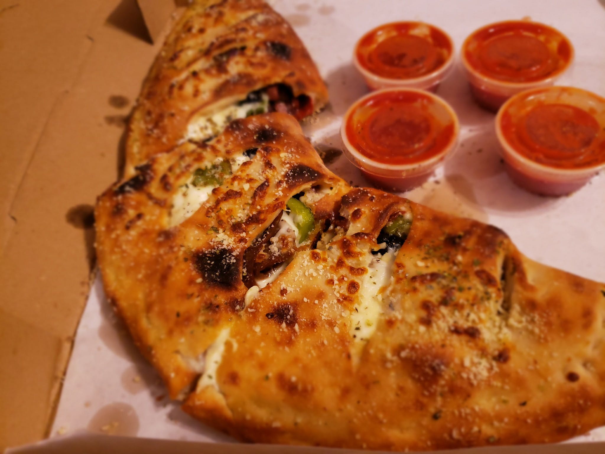Order Spinach Calzone - Medium food online from Italian Pizza & Grill store, Daytona Beach on bringmethat.com