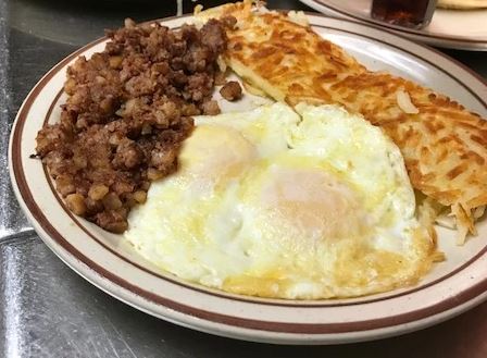 Order 2 Egg and Corned Beef Hash food online from Waffles Breakfast & Lunch store, Salinas on bringmethat.com