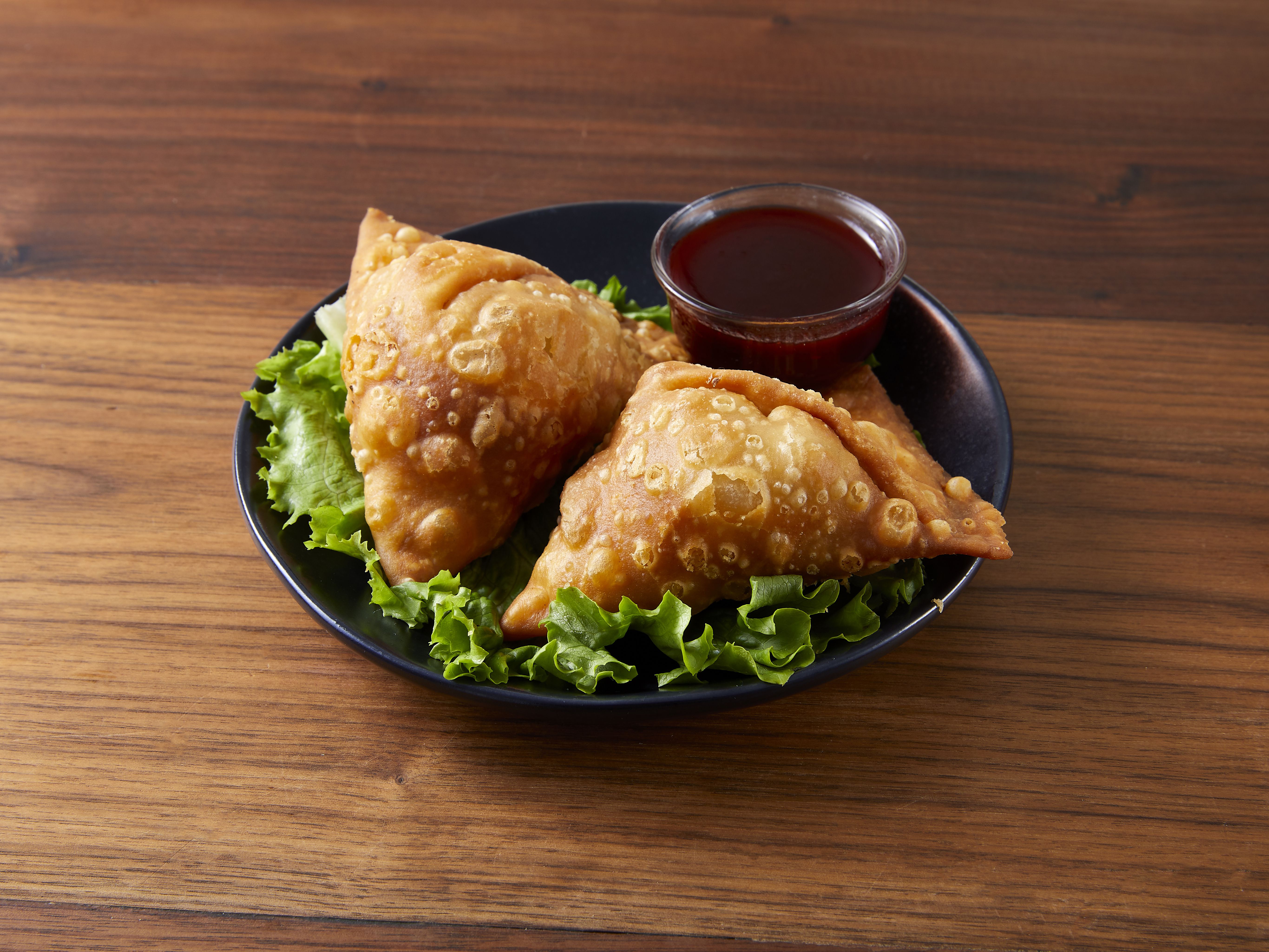 Order 2 Pieces Vegetable Samosa food online from New Delhi Restaurant store, Sterling Heights on bringmethat.com