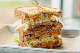 Order Fried Green Tomato Sandwich food online from Trend Urban Cafe store, Stone Mountain on bringmethat.com