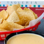 Order Chips & Queso food online from El Taxqueno Taqueria store, Dallas on bringmethat.com