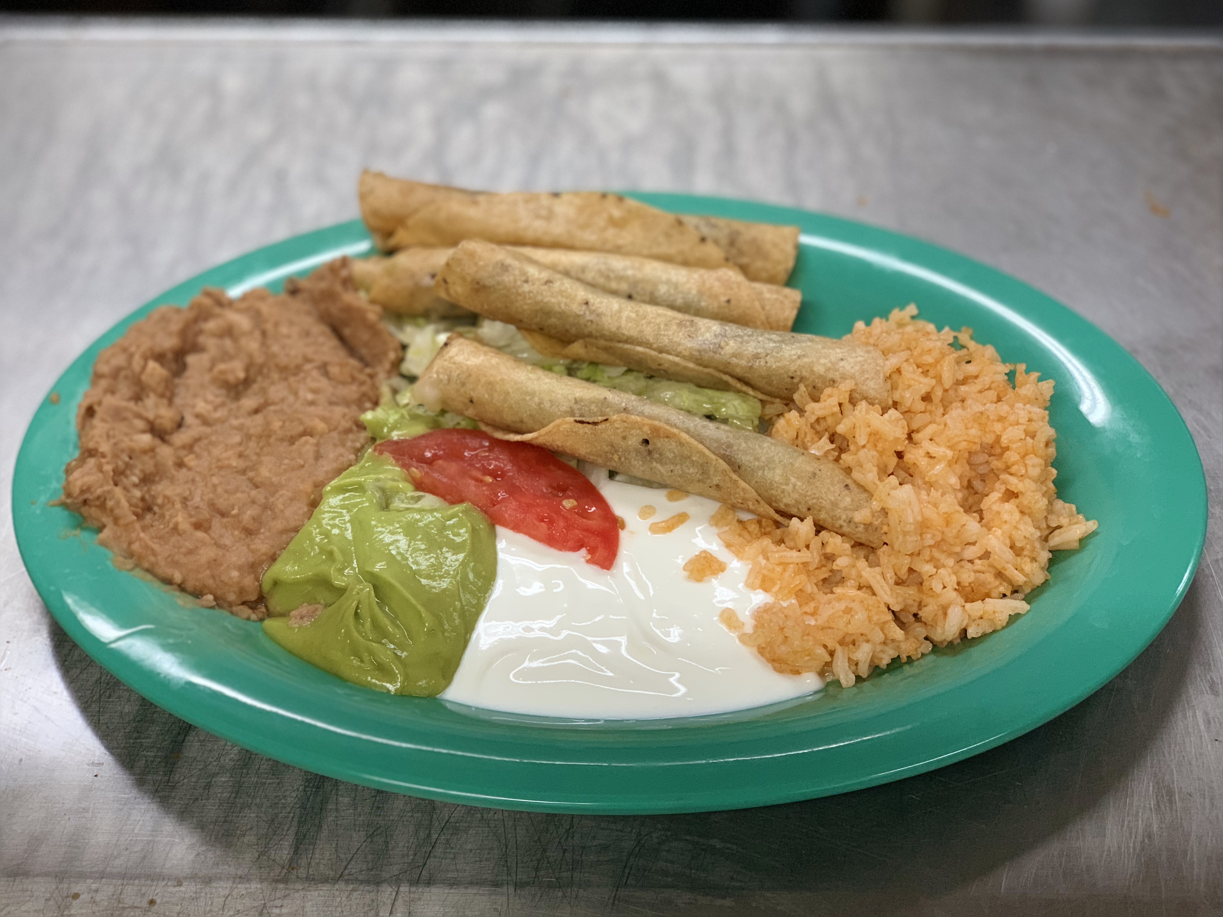Order Chicken Flautas food online from Cuauhtemoc Cafe store, El Paso on bringmethat.com