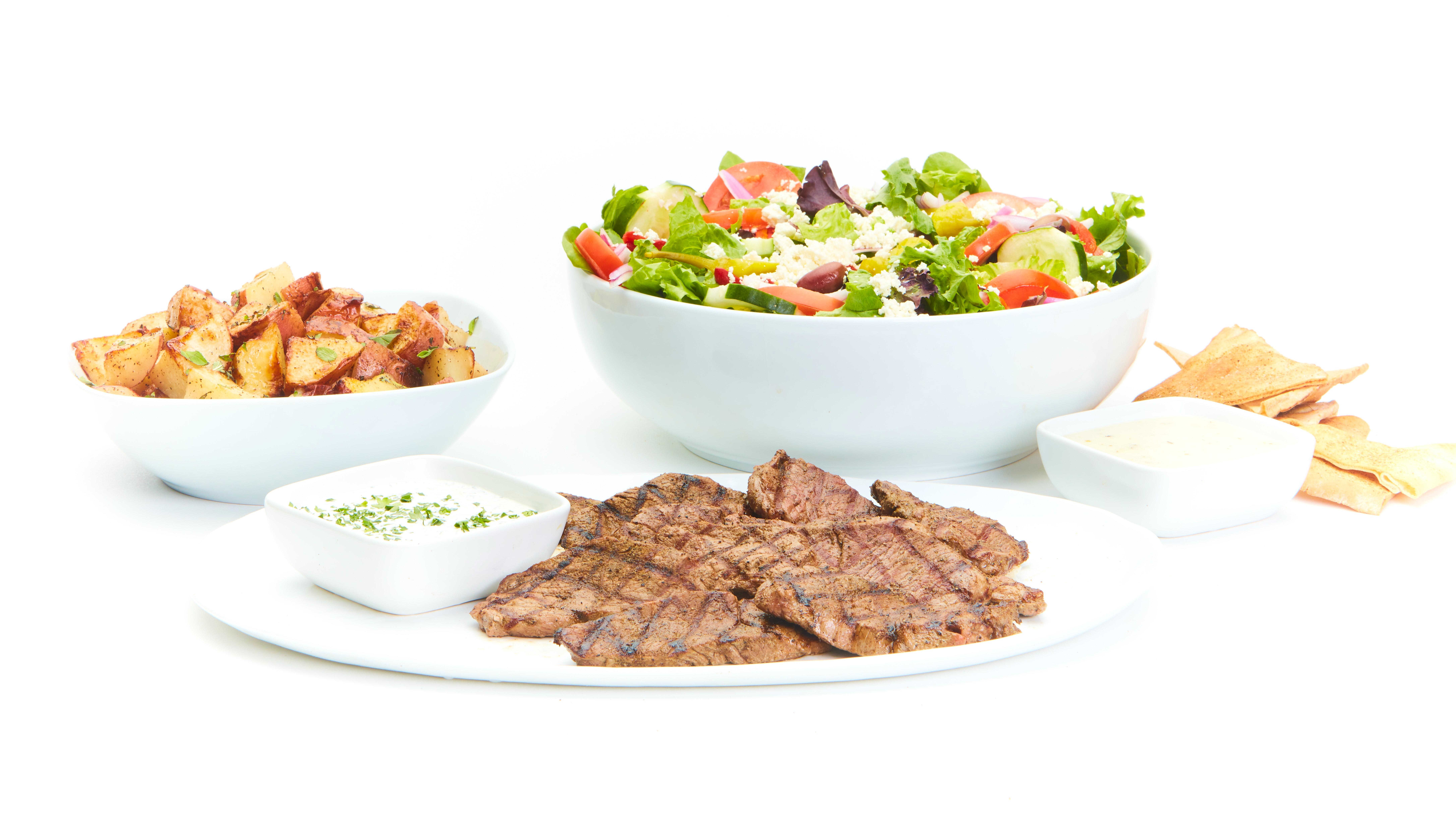 Order Grilled Lamb Feast for 4 food online from Tazikis Mediterranean Cafe store, Denver on bringmethat.com