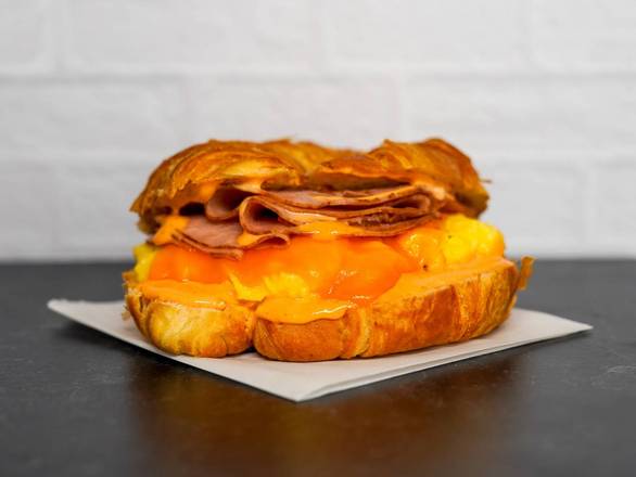 Order Croissant, Ham, Egg, & Cheddar food online from Neighborhood Cafe store, Hopewell on bringmethat.com