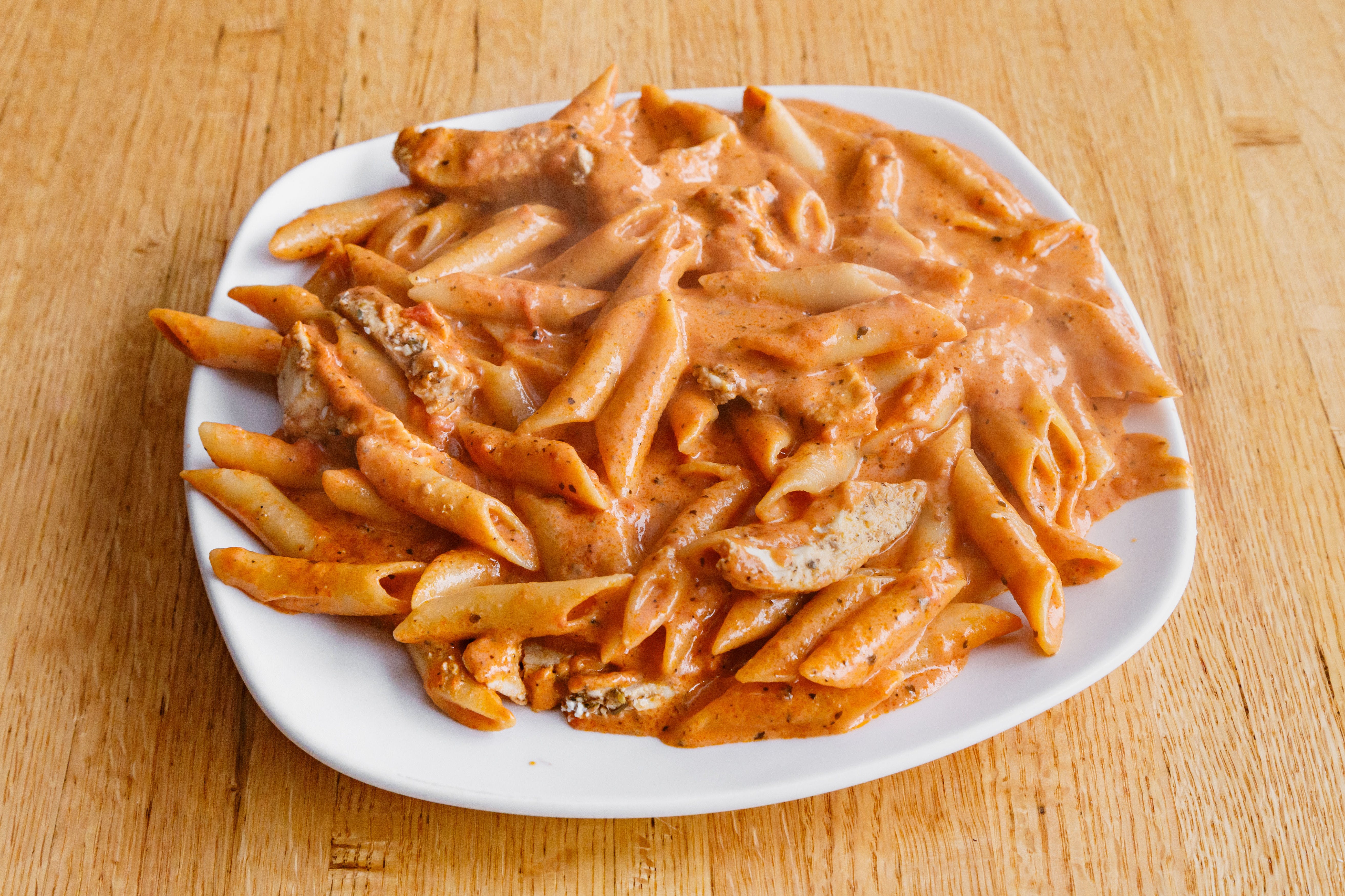 Order Penne Vodka with Chicken - Pasta food online from Giovanni's Pizza & Pasta store, Pittsburgh on bringmethat.com