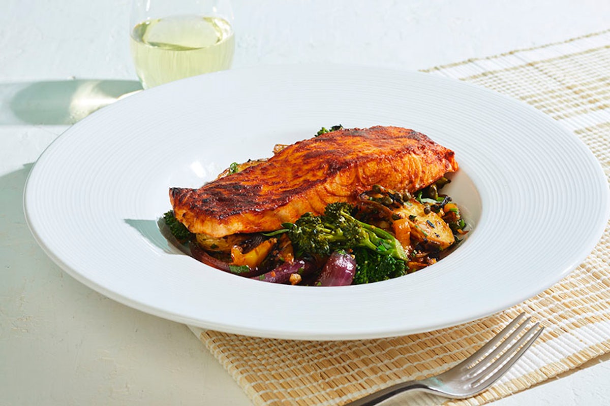 Order SALMON WITH PAN-ROASTED SEASONAL VEGETABLES food online from California Pizza Kitchen store, Hollywood on bringmethat.com