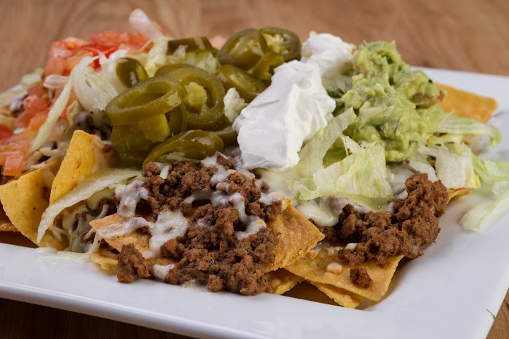 Order Nachos Supremos food online from Taqueria Mexico store, Hoover on bringmethat.com