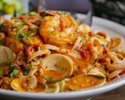Order Pasta Di Mare food online from New York Pizzeria store, Houston on bringmethat.com