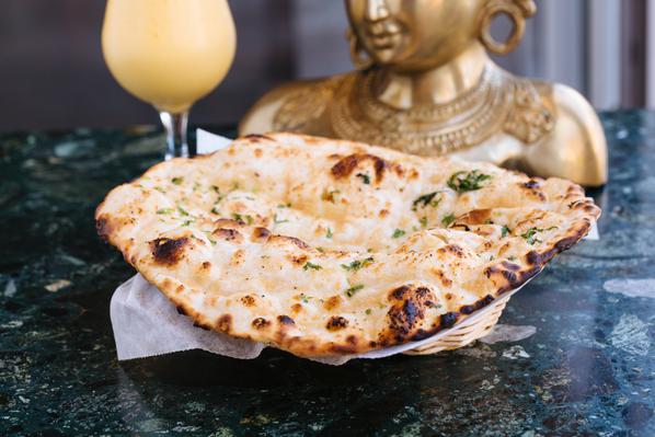 Order Naan food online from New Delhi Indian Restaurant store, Philadelphia on bringmethat.com