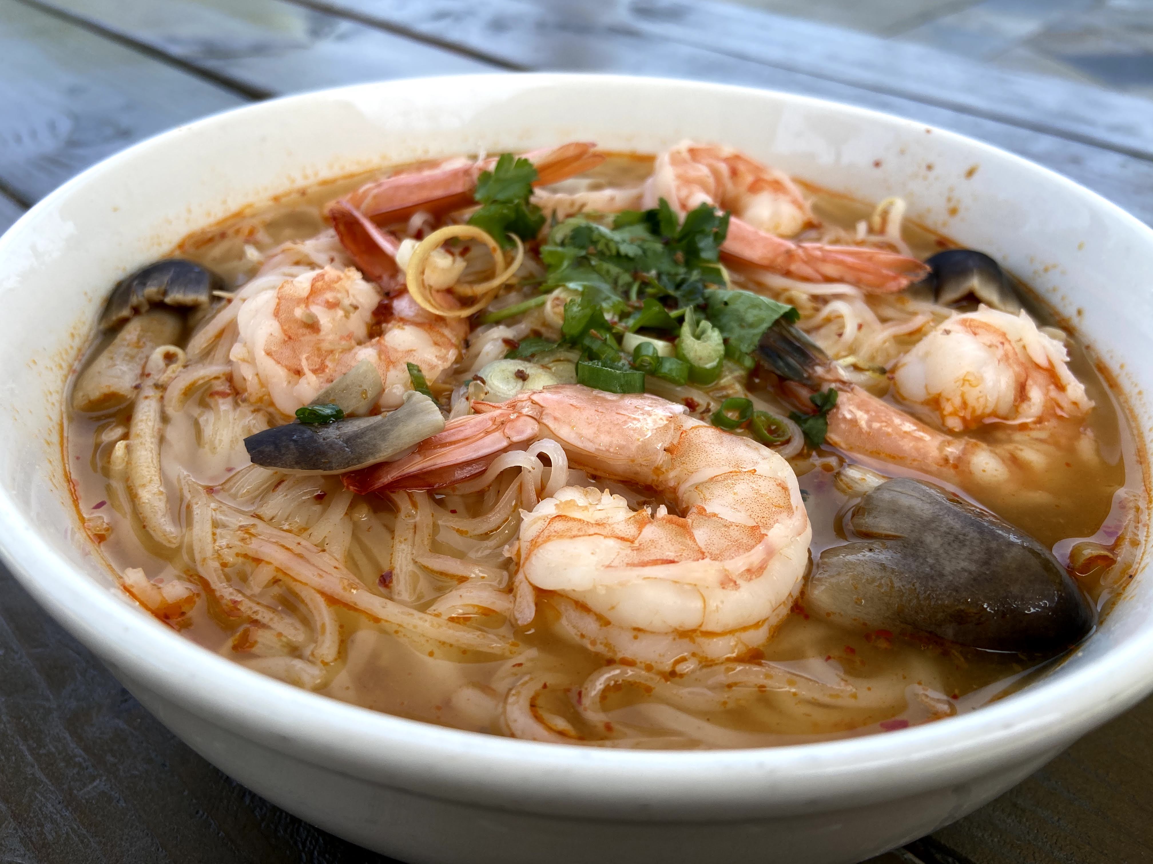 Order 33. Tom Yum Noodle Soup food online from Aura Thai - Long Beach store, Long Beach on bringmethat.com