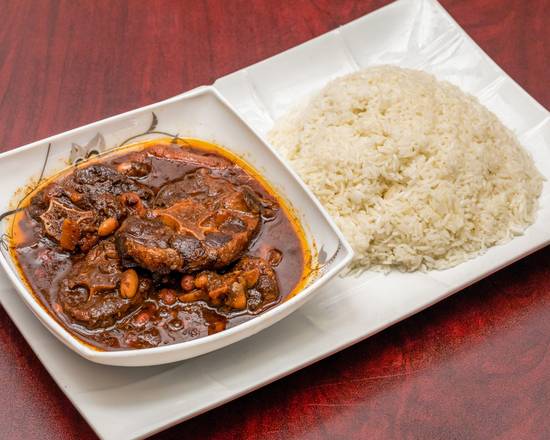 Order Oxtail with Rice food online from Le Mandingue store, Upper Darby on bringmethat.com