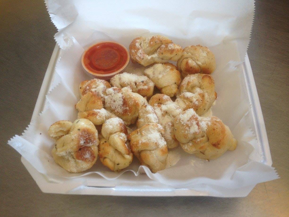 Order Garlic Knots - 12 Pieces food online from Pizza Xpress store, Selma on bringmethat.com