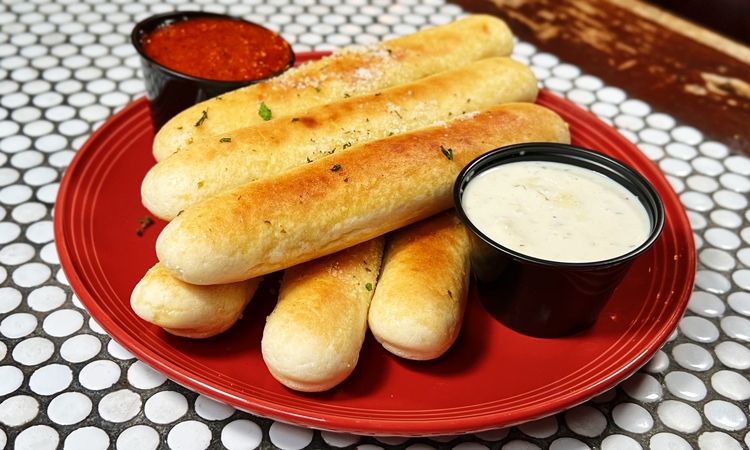 Order Garlic Breadsticks food online from Gino's East store, Chicago on bringmethat.com