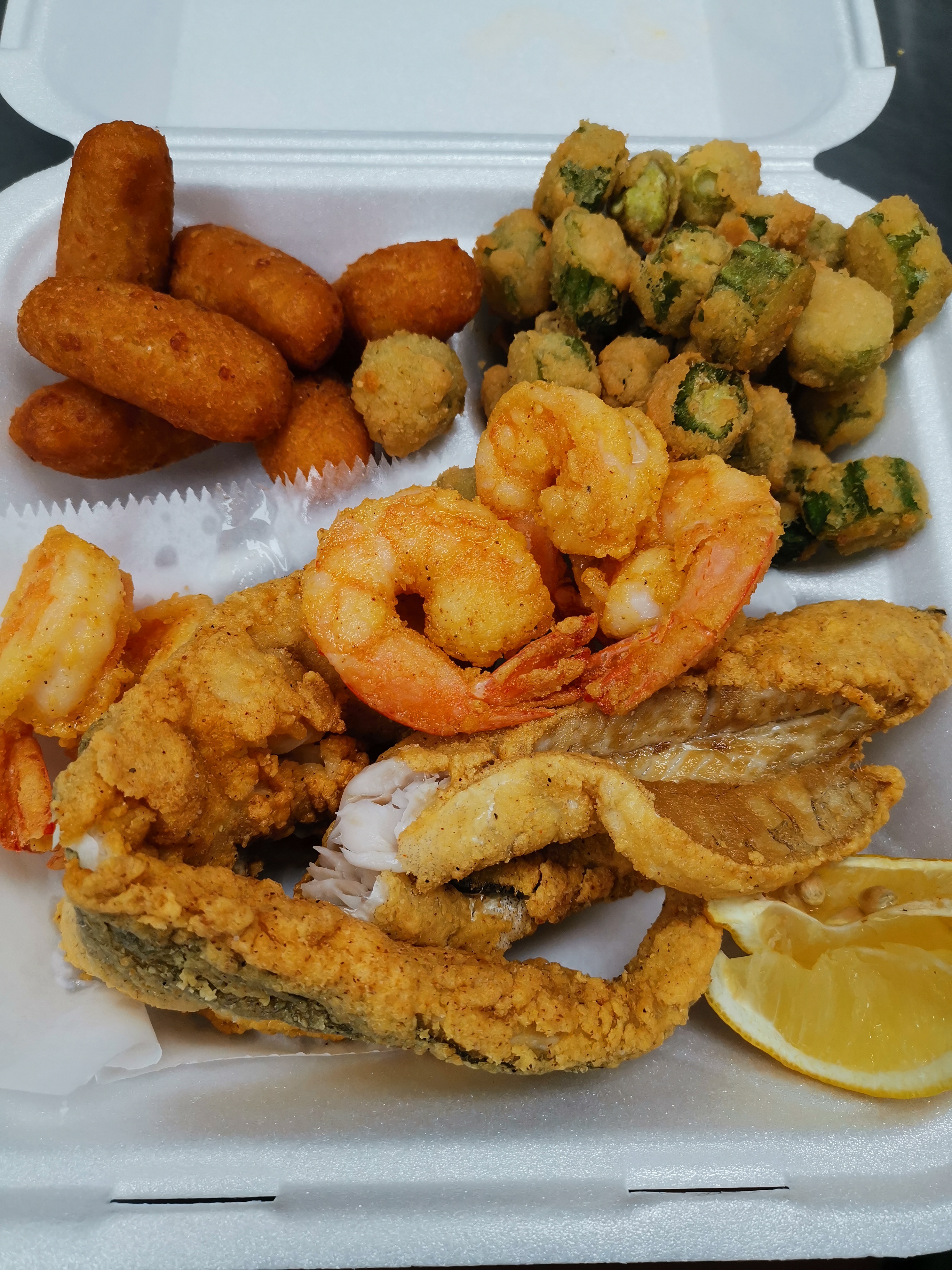 Order #1. Two Whiting and 5 Shrimp food online from Cajun Seafood & Grill store, Greensboro on bringmethat.com