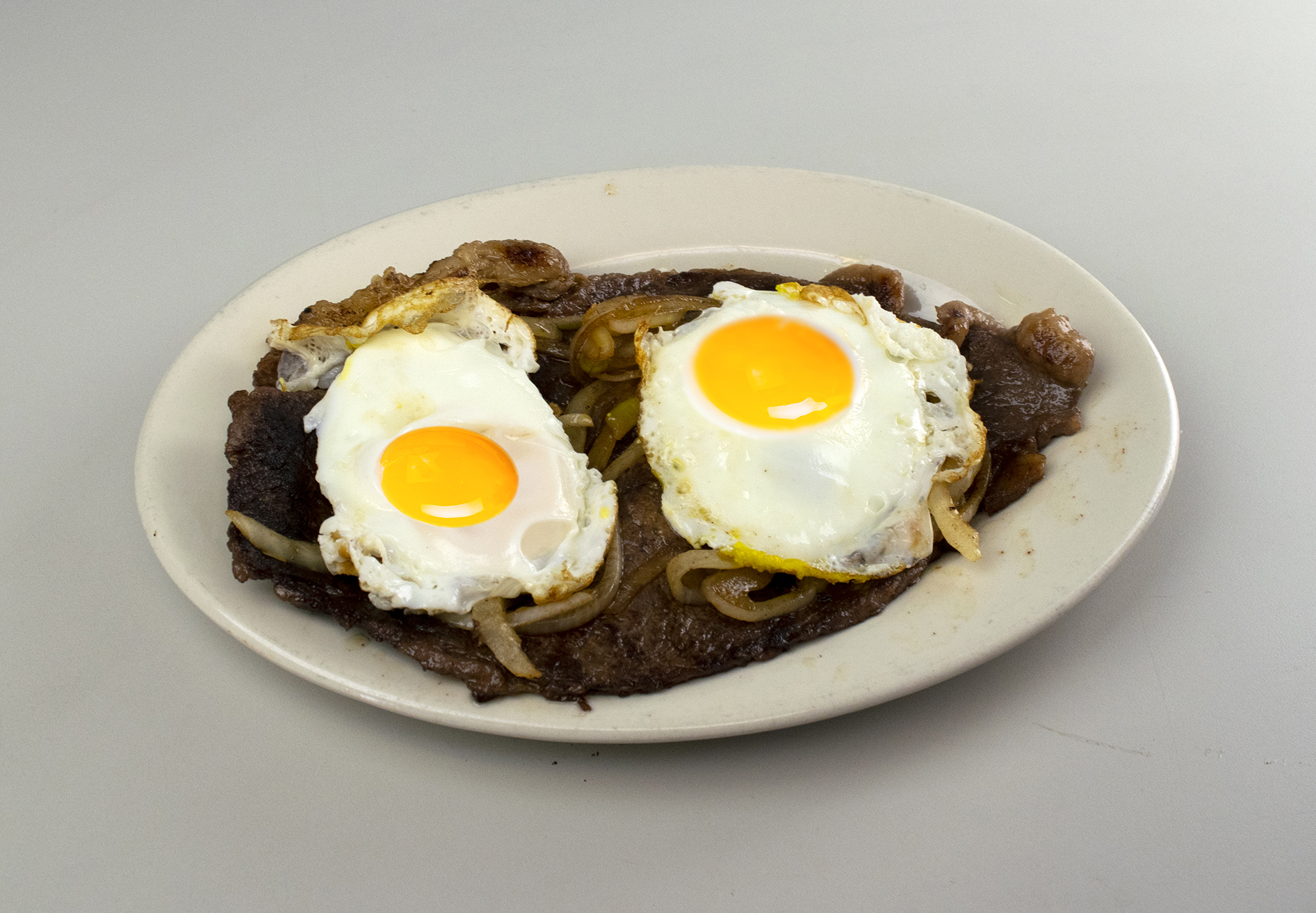 Order Bistec a Caballo  food online from La Ilusion Restaurant store, West New York on bringmethat.com
