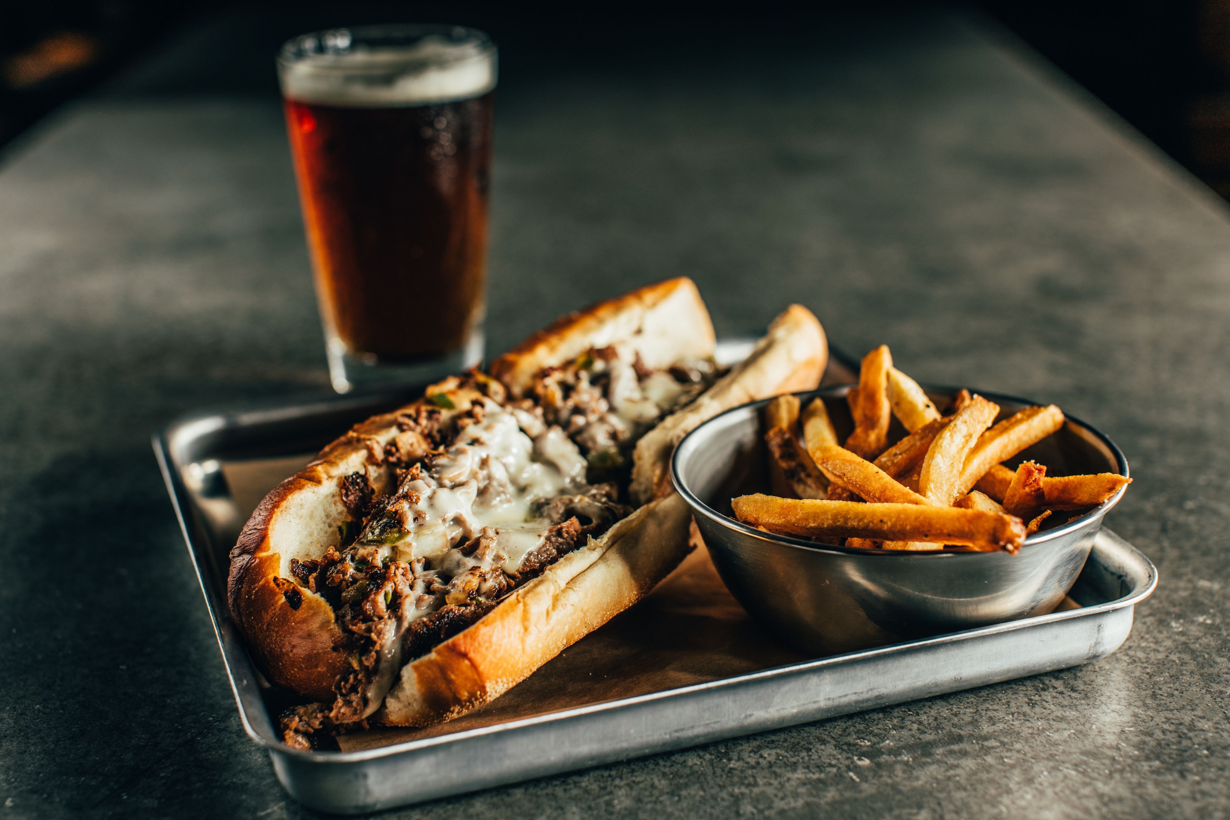 Order Philly Cheesesteak Supreme food online from Duckworth's Grill & Taphouse Uptown store, Charlotte on bringmethat.com