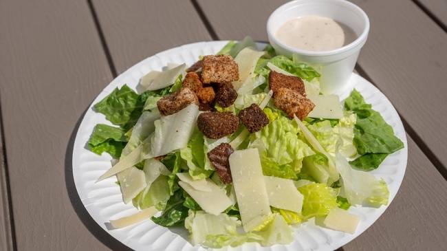 Order Caesar Salad food online from Pizza Leon store, Austin on bringmethat.com