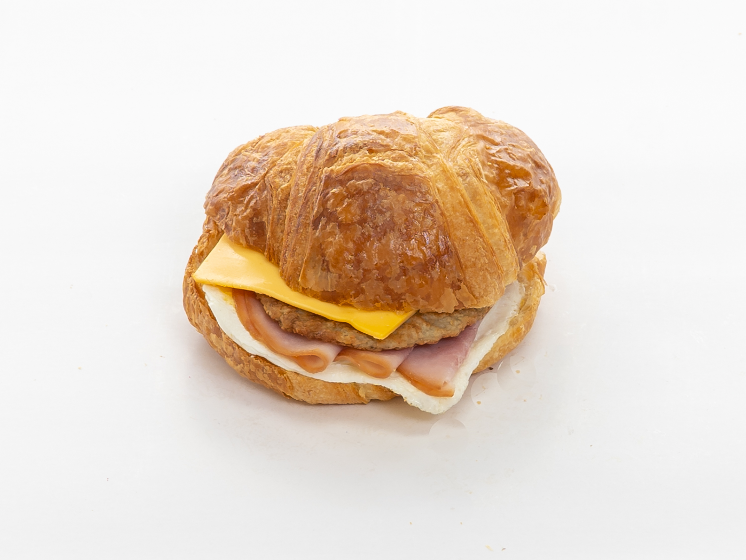Order Sausage, Ham, Egg and Cheese Sandwich food online from Moon's Donuts store, Irving on bringmethat.com