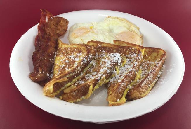 Order 3. 2 French Toast, 2 Eggs and 3 Bacon or 3 Sausage  food online from Michael's Burgers store, Canoga Park on bringmethat.com