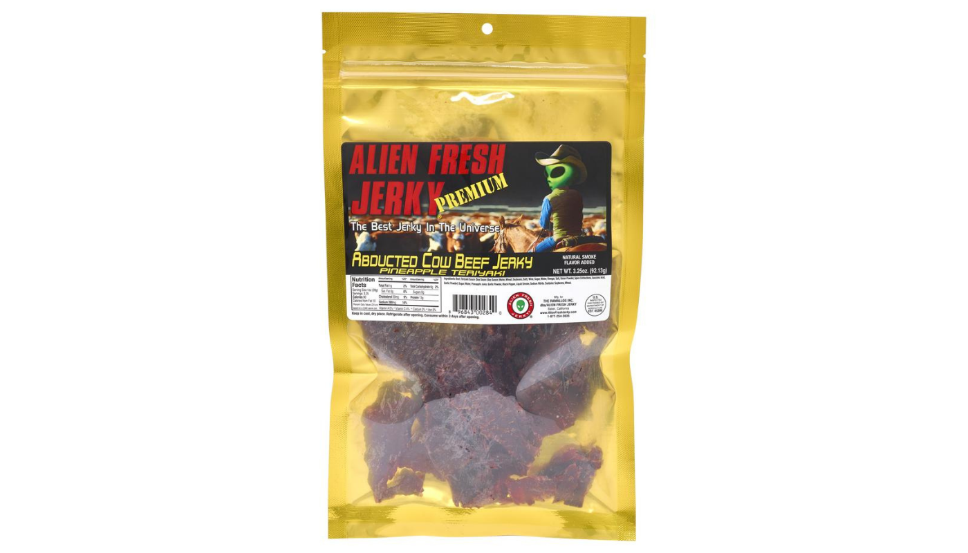 Order Alien Fresh Abducted Cow Pineapple Teriyaki Beef Jery 3.25oz food online from Country Cousins Liquor & Jr Market store, Sylmar on bringmethat.com